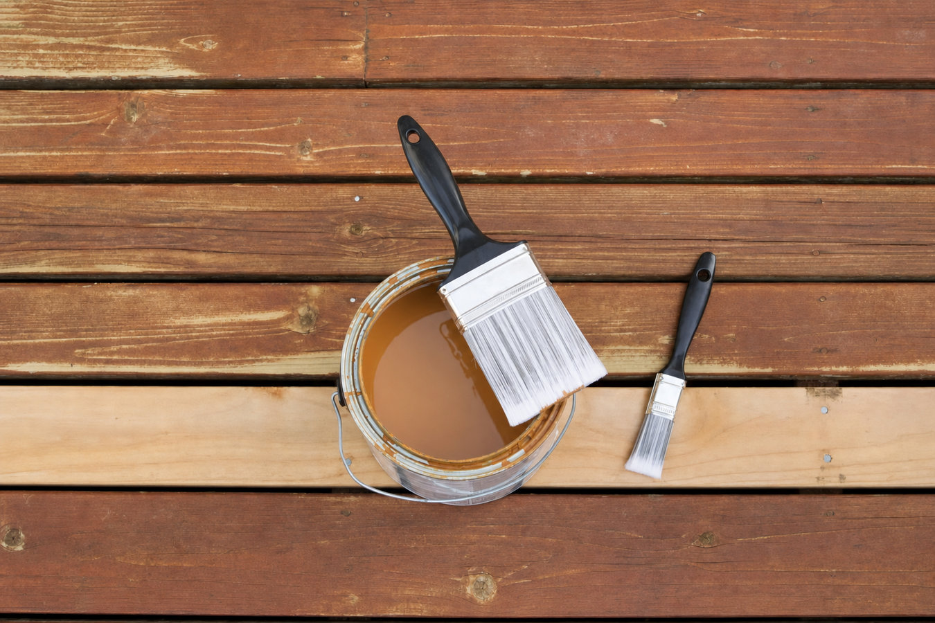 Deck staining and sealing
